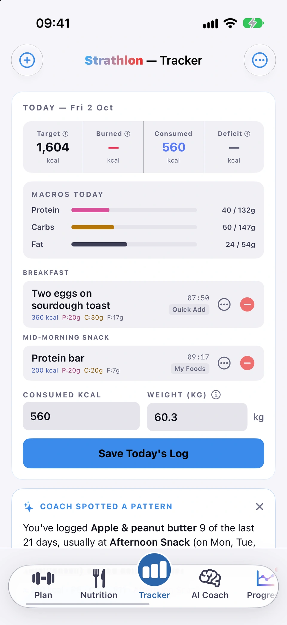 Strathlon Tracker, scrolled from top to bottom: today, Friday 2 October, with a target of 1,604 kcal, 560 kcal eaten so far and the burn and deficit still to come; macros today, protein 40 of 132 g, carbs 50 of 147 g, fat 24 of 54 g; breakfast of two eggs on sourdough toast, 360 kcal, and a mid-morning protein bar, 200 kcal; weight 60.3 kg; the coach spotting that apple and peanut butter is a usual afternoon snack and offering to add it automatically; quick-add favourites; then the days list: yesterday a rest day, 1,780 kcal eaten and 2,214 burned, 434 under; Wednesday a rest day, 111 under; Tuesday a gym day with a Push session, 662 under.